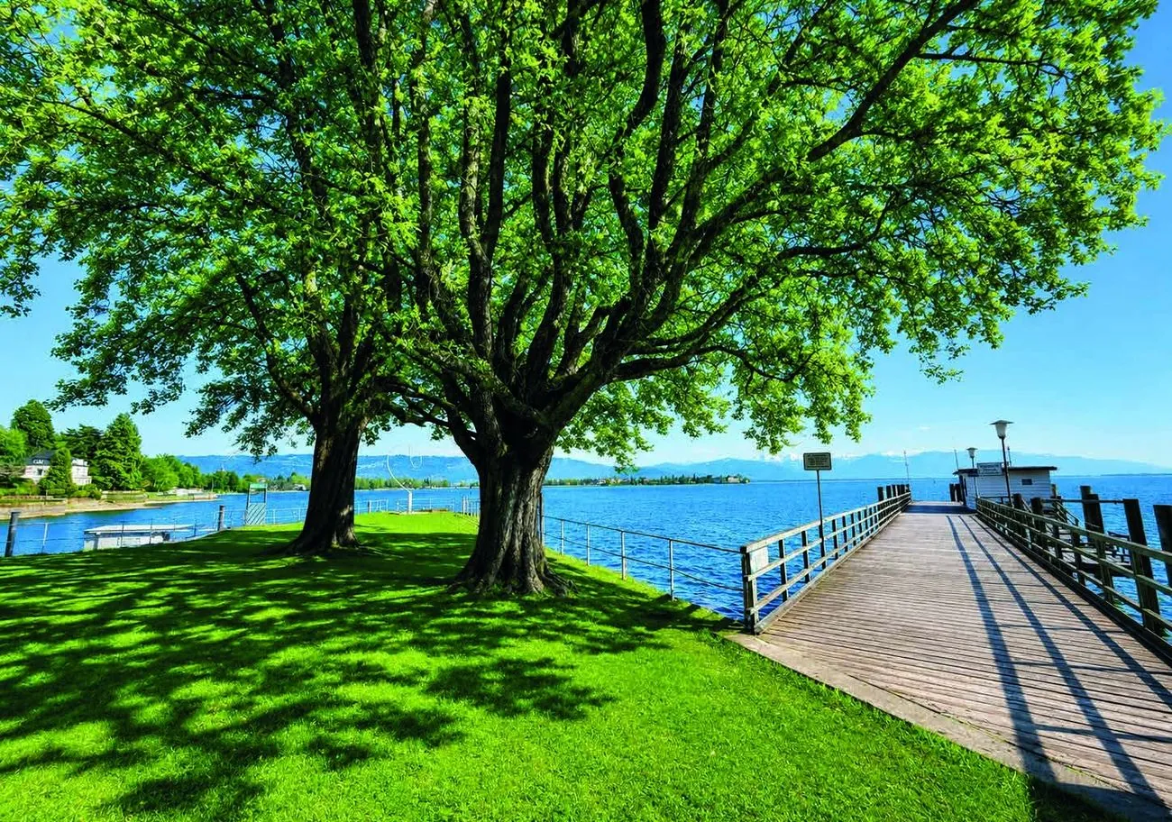 Seepromenade Bad Schachen mit Bootsanlegesteg