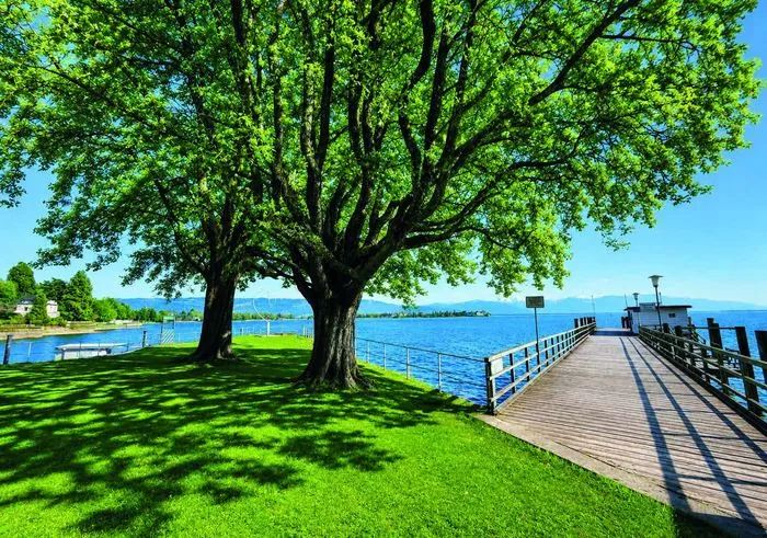 Seepromenade Bad Schachen mit Bootsanlegesteg